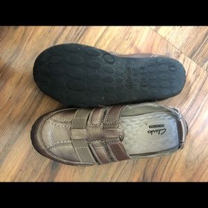 Clark’s slip on. Worn a few time.